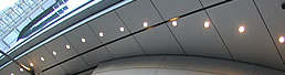 The realisation of Simon Morris's lighting design concept, the lighting seamlessly flowing from external to internal lighting whist following the buildings curved structure.